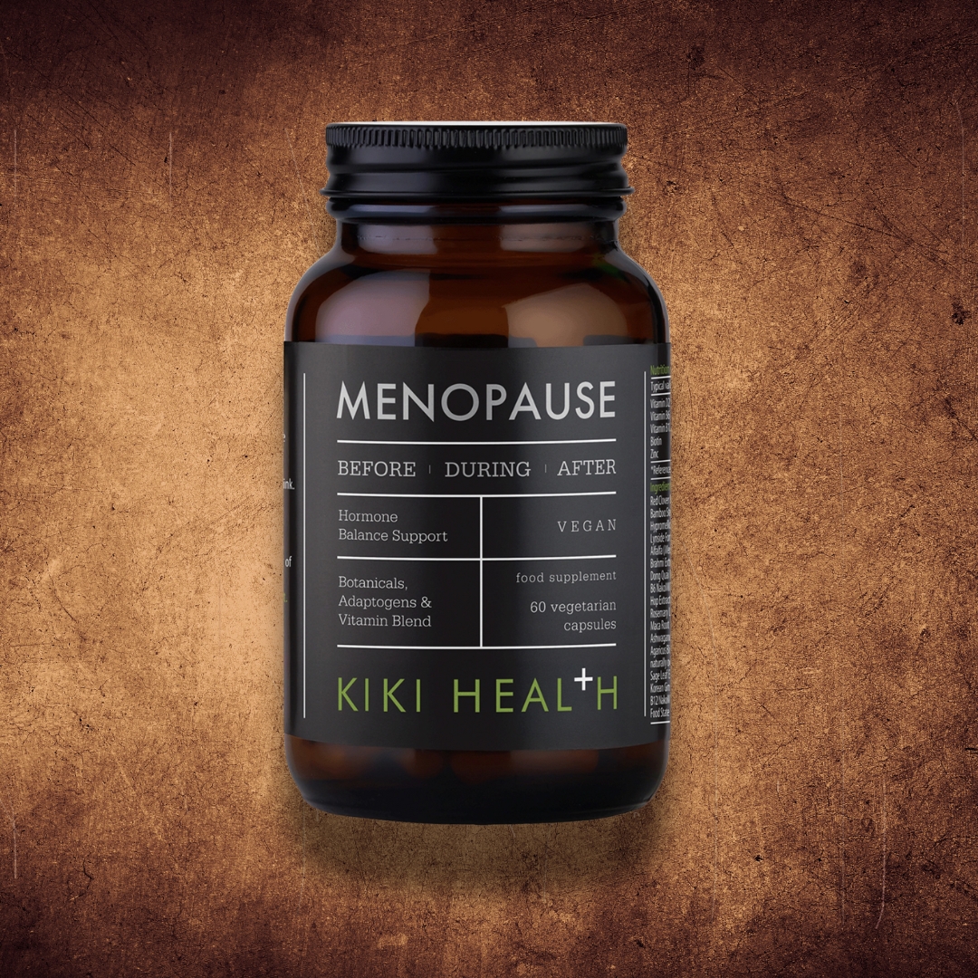 KIKI Health Menopause Support capsules bottle against rustic textured background for natural supplement imagery