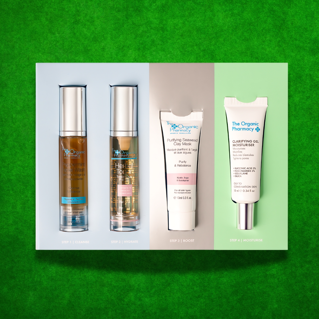 The Organic Pharmacy Power Pure Skincare Kit open box with facial wash, toner, clay mask, and moisturiser
