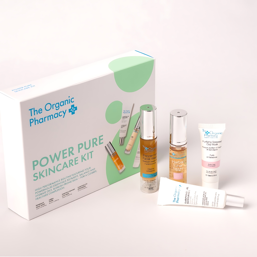 The Organic Pharmacy Power Pure Skincare Kit products lined up including facial wash, toner, clay mask, and gel moisturiser