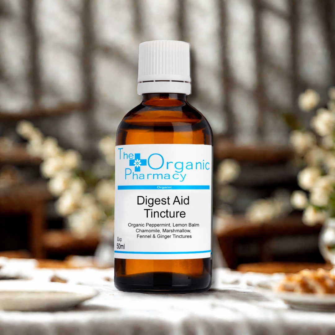 The Organic Pharmacy Digest Aid Tincture 50ml herbal formula bottle on rustic background for digestive health support