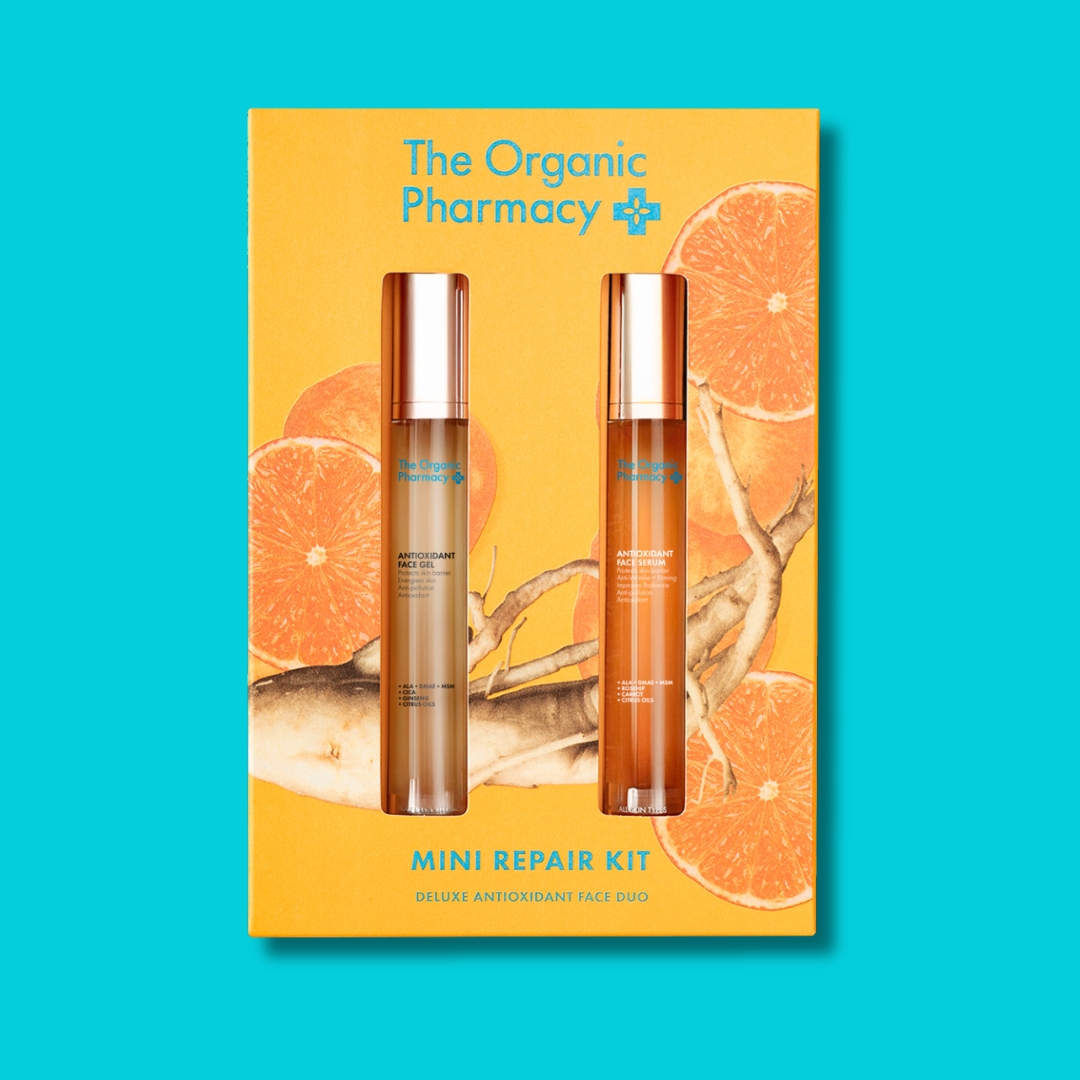 The Organic Pharmacy Mini Repair Kit Deluxe Antioxidant Face Duo in citrus-inspired packaging