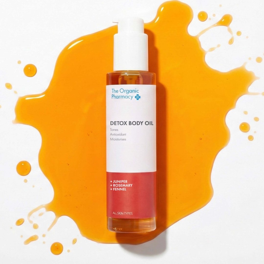 Liquid texture swatch of golden botanical Detox Body Oil by The Organic Pharmacy.