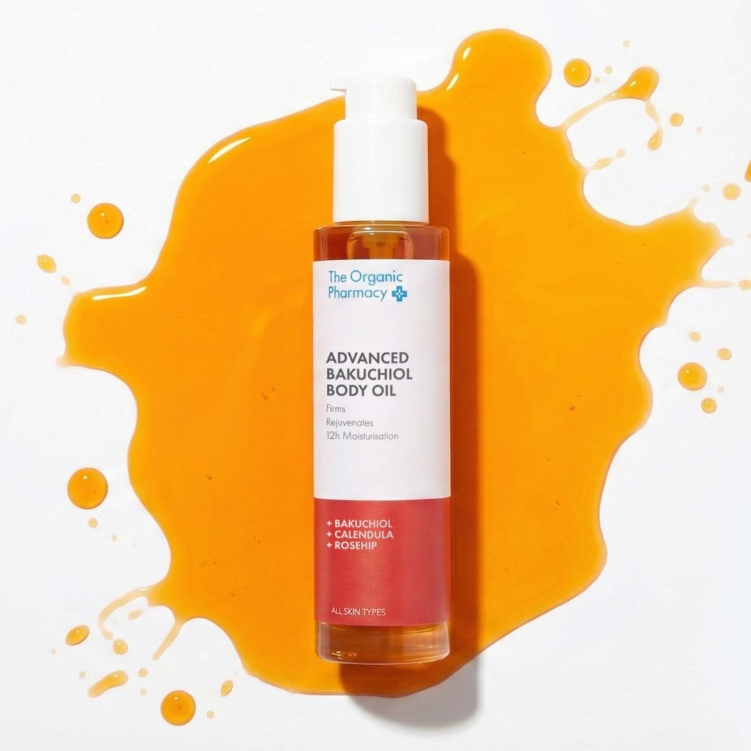 Close-up texture swatch of The Organic Pharmacy Advanced Bakuchiol Body Oil showing its rich golden hue.